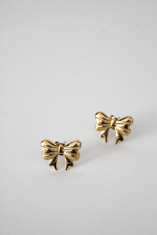 Bow medium size earrings. Waterpoof.  Girly earring. Feminine jewelry. Bow trendy jewelry. Affordable. Swiss brand. 